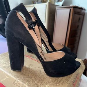 Black suede material platform heels. 9.5